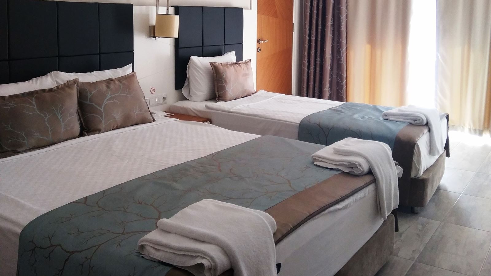 rooms-b-block-standard-room-side-sea-view-with-balcony