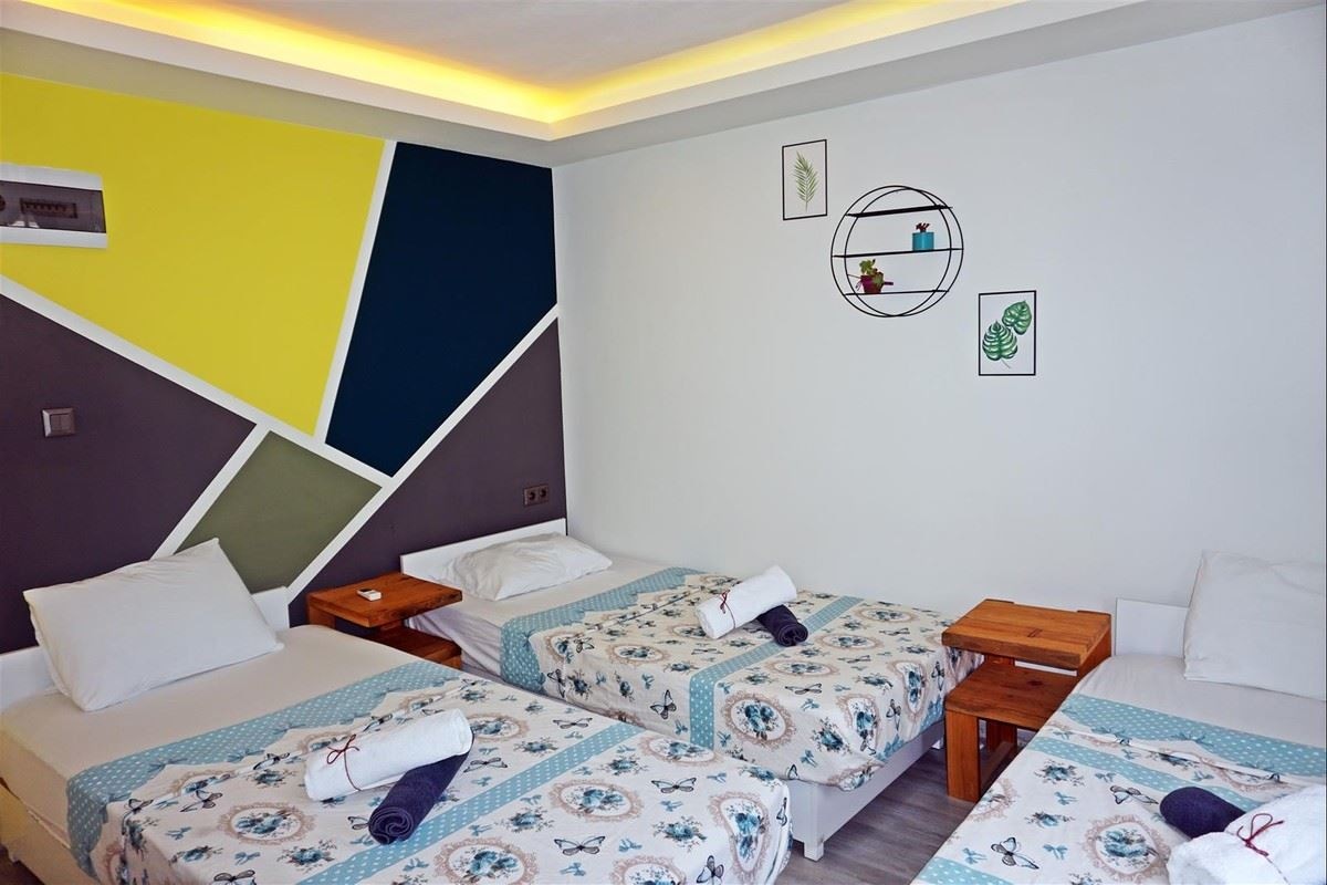 rooms-uc-kisilik-oda