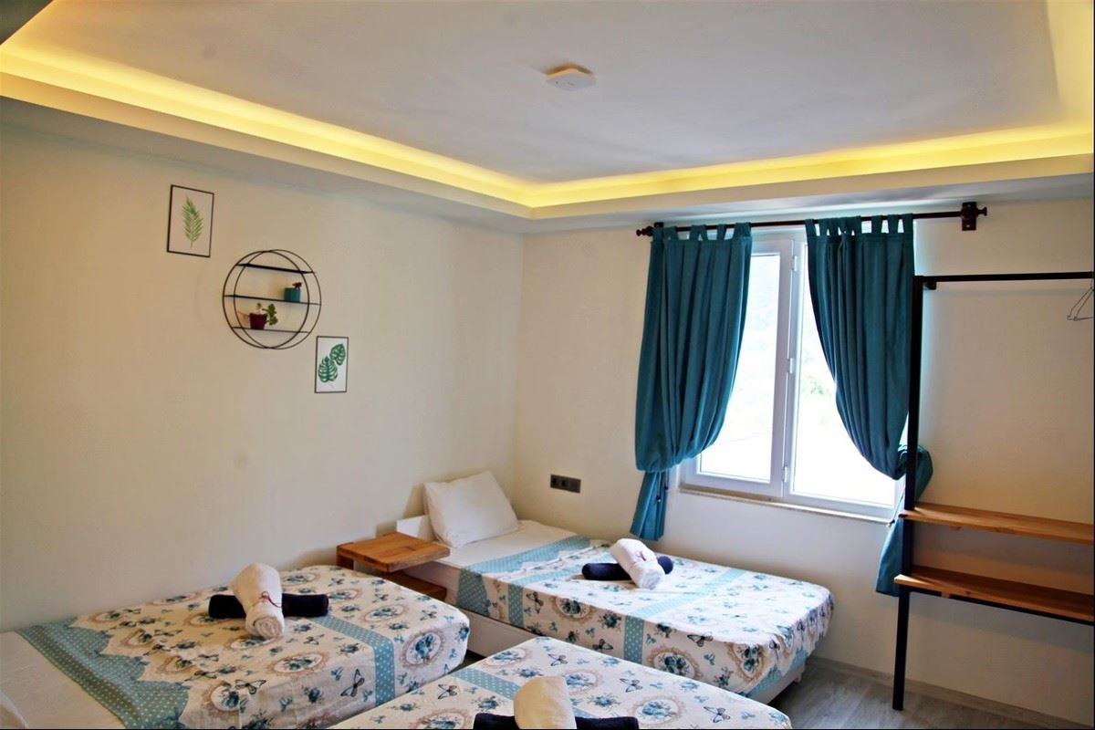 rooms-uc-kisilik-oda