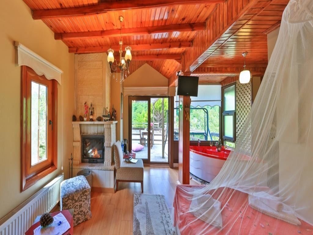 rooms-cift-kisilik-somineli-spa-kuvetli-terasli-nehir-manzarali-oda