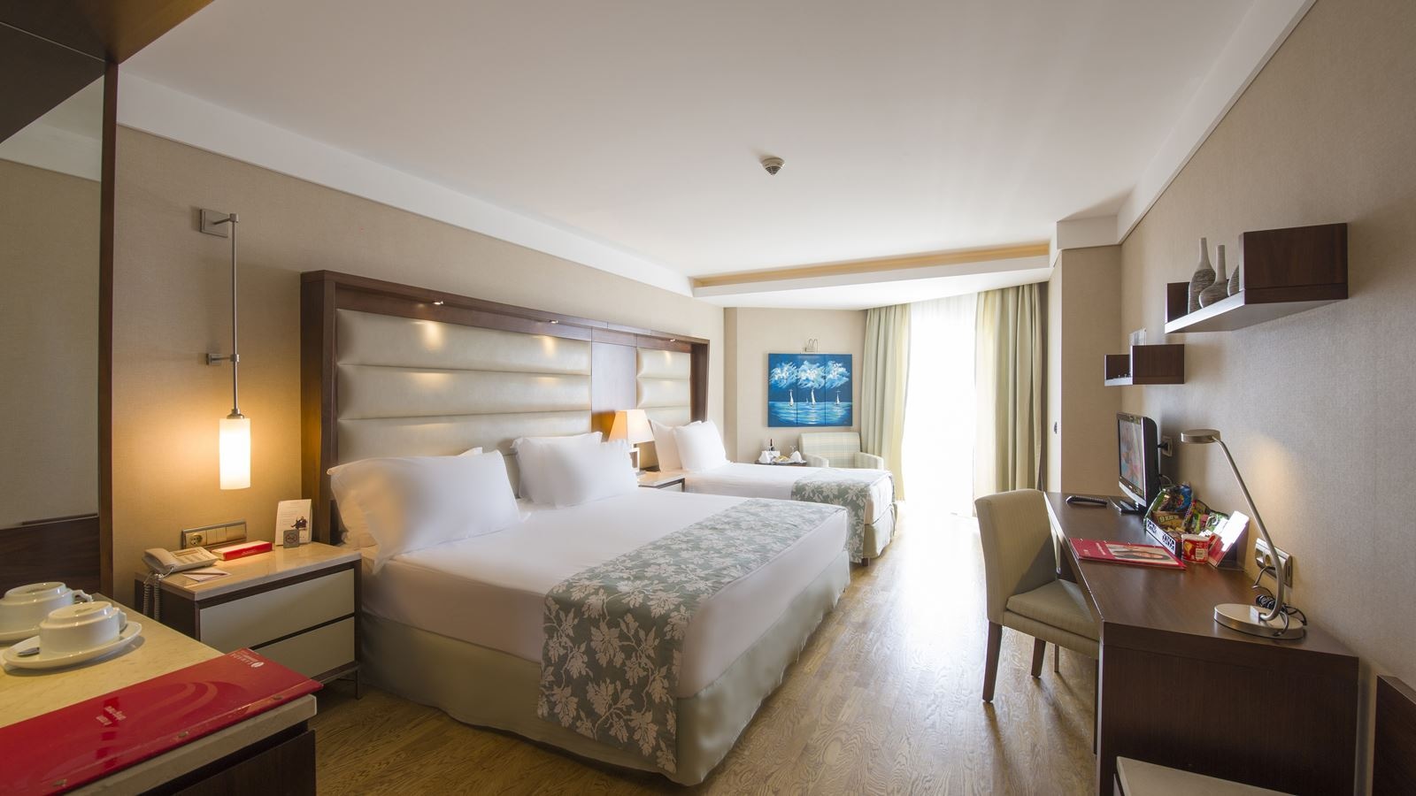 rooms-deluxe-room-side-sea-view-with-balcony