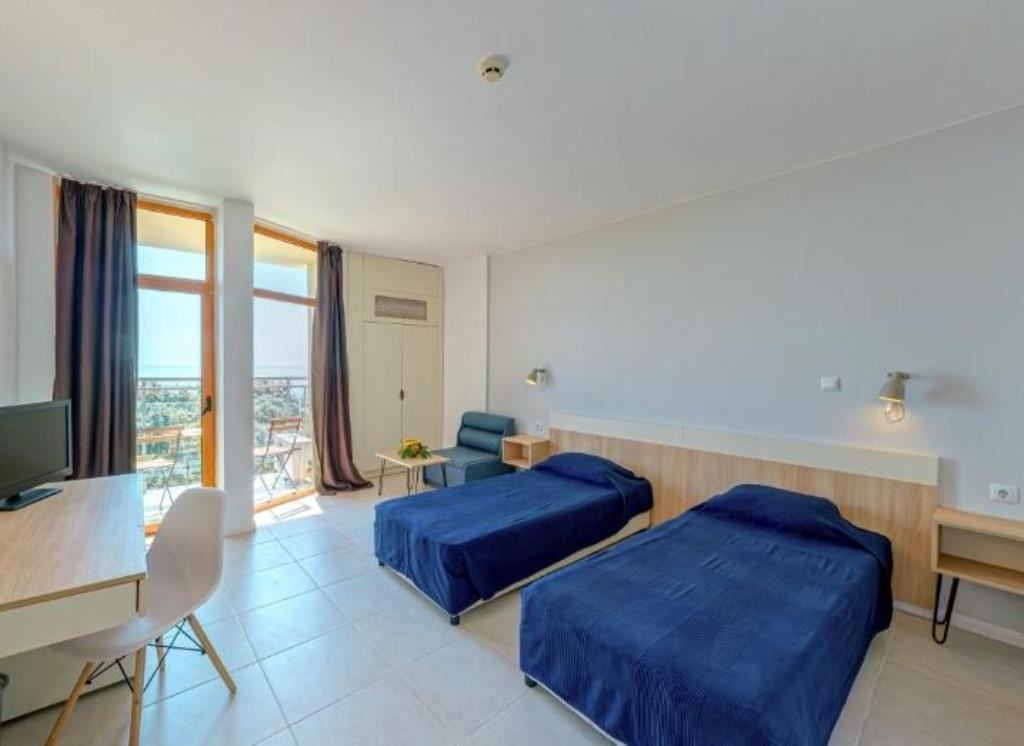 rooms-twin-standard-room-seaview-balcony-or-terrace