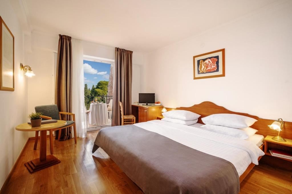 rooms-double-standard-room-sea-side-balcony-or-terrace