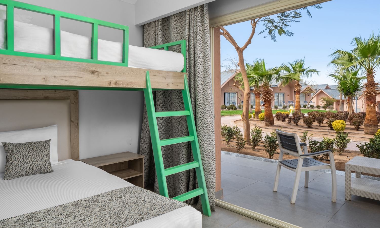 rooms-family-bungalow-sliding-door-pool-view