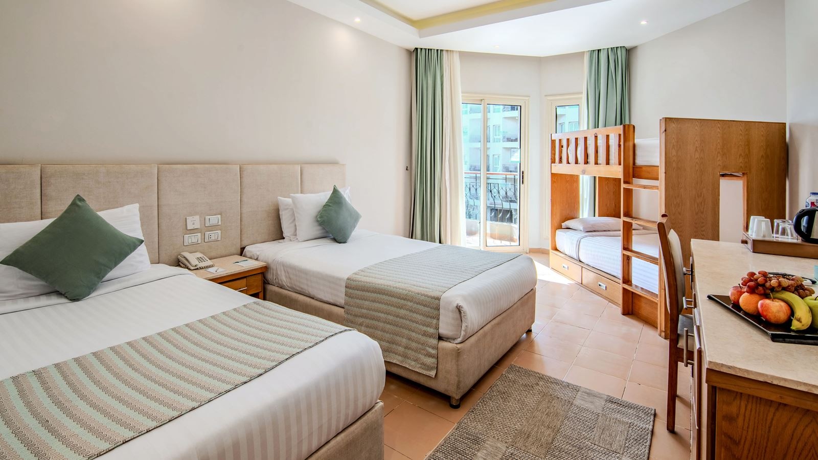 rooms-family-bunkbed-room-poolside-seabackgarden-view