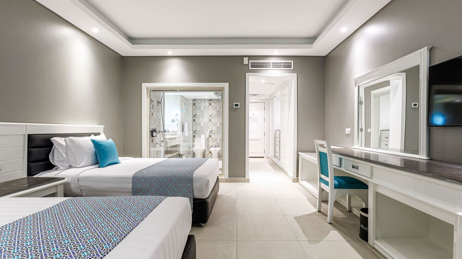 rooms-deluxe-room-garden-pool-sea-view