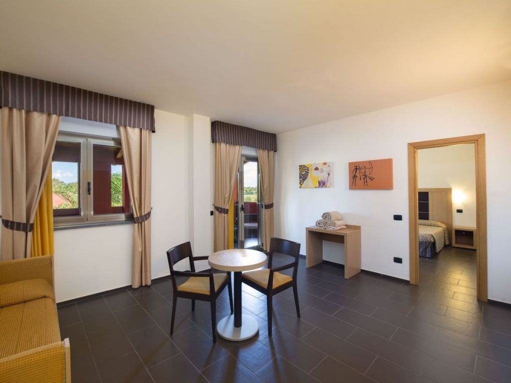 rooms-family-garden-view-with-balcony-or-terrace-4-pax