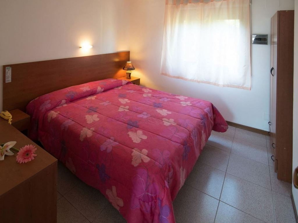 rooms-1-bedroom-24-pax-garden-view-with-balcony-or-terrace