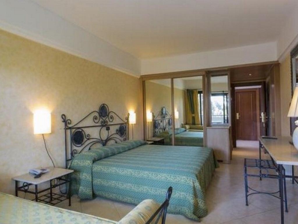 rooms-superior-room-garden-view-with-balcony-or-terrace