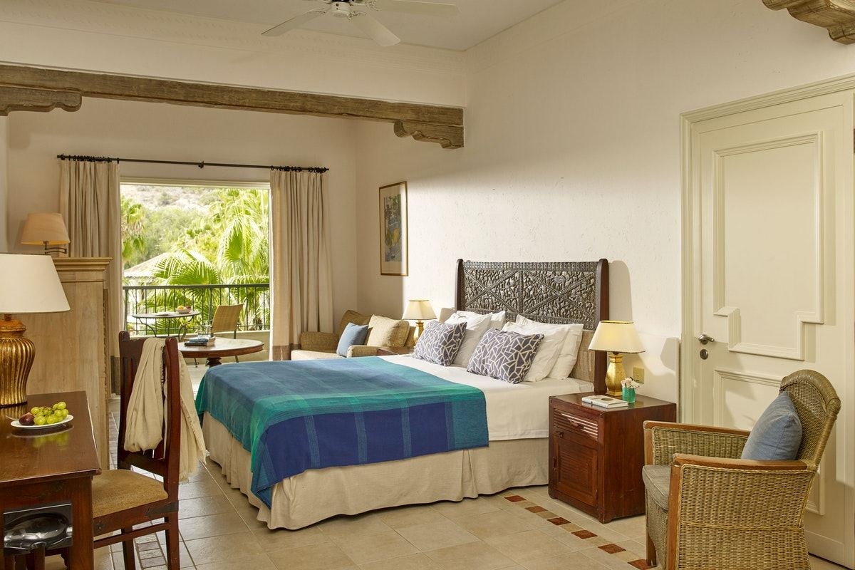 rooms-standard-juniorsuite-gardenview-balcony-or-terrace