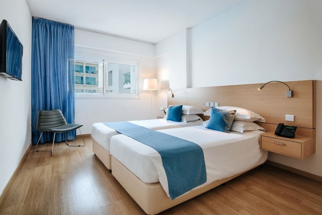 rooms-deluxe-family-room-pool-view-balcony-or-terrace