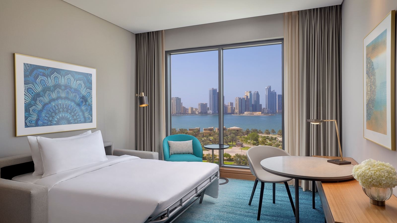 rooms-king-deluxe-room-w-sofa-bed-waterfront-view