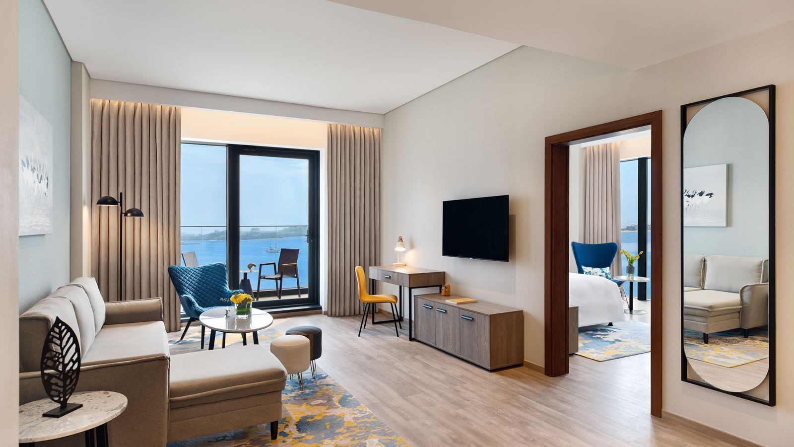 rooms-panoramic-beachfront-view-suite-with-sofa-bed-and-balcony