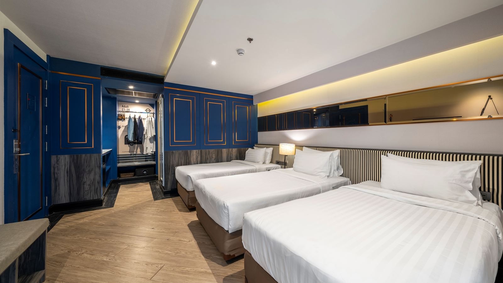rooms-deluxe-discovery-triple-bed