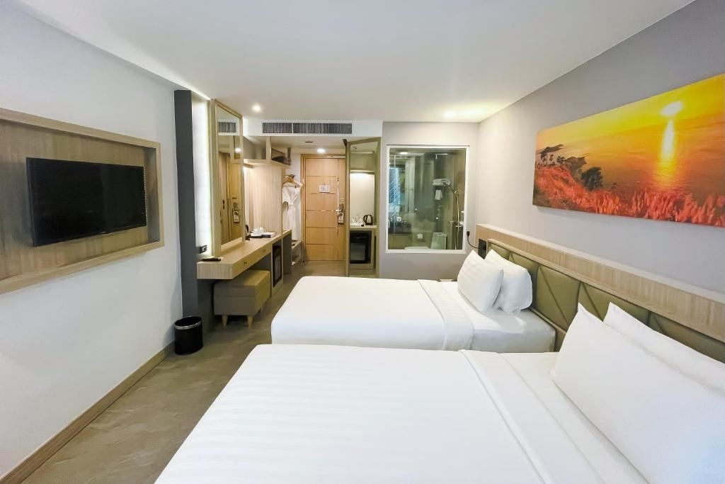 rooms-deluxe-twin-balcony-room