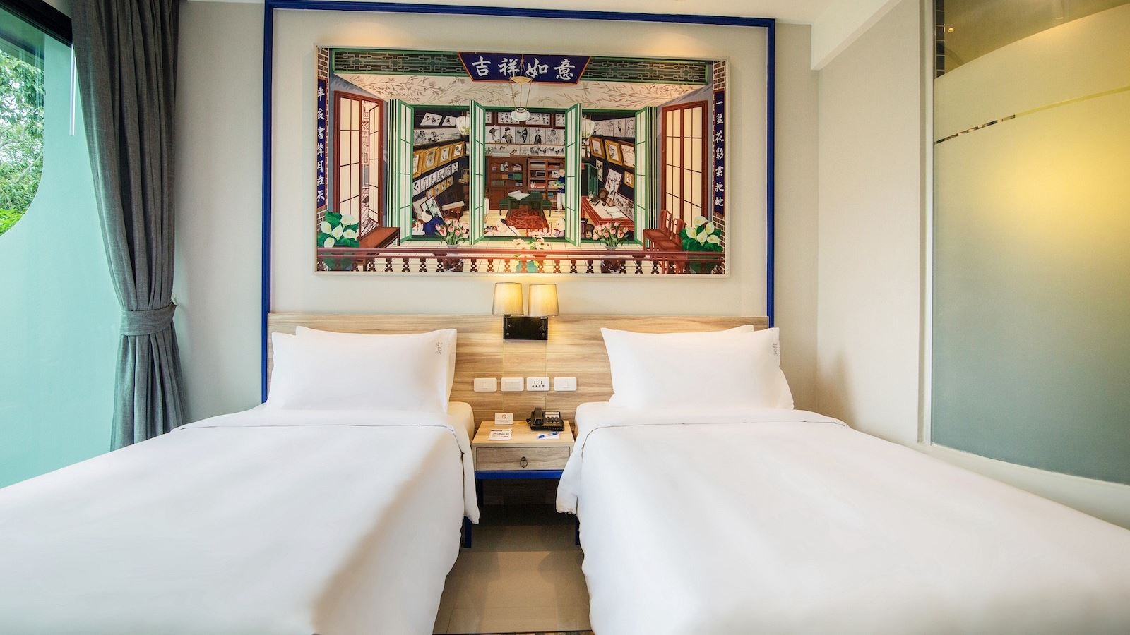 rooms-two-bedroom-family-garden-view-suite-child-sharing-bed