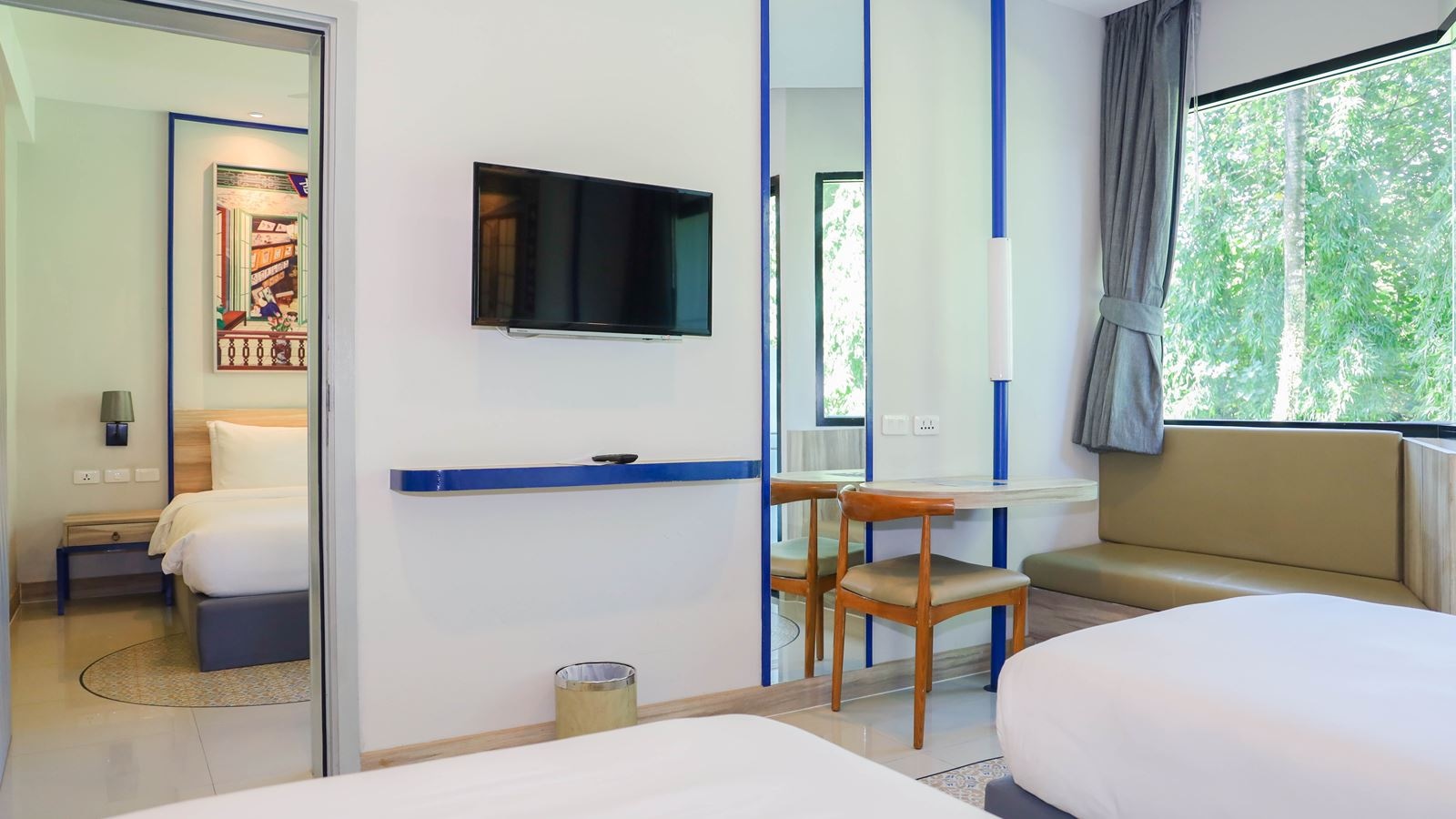 rooms-two-bedroom-family-garden-view-suite-child-sharing-bed