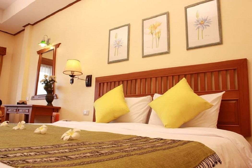 rooms-deluxe-room-with-kitchen-room-or-balcony