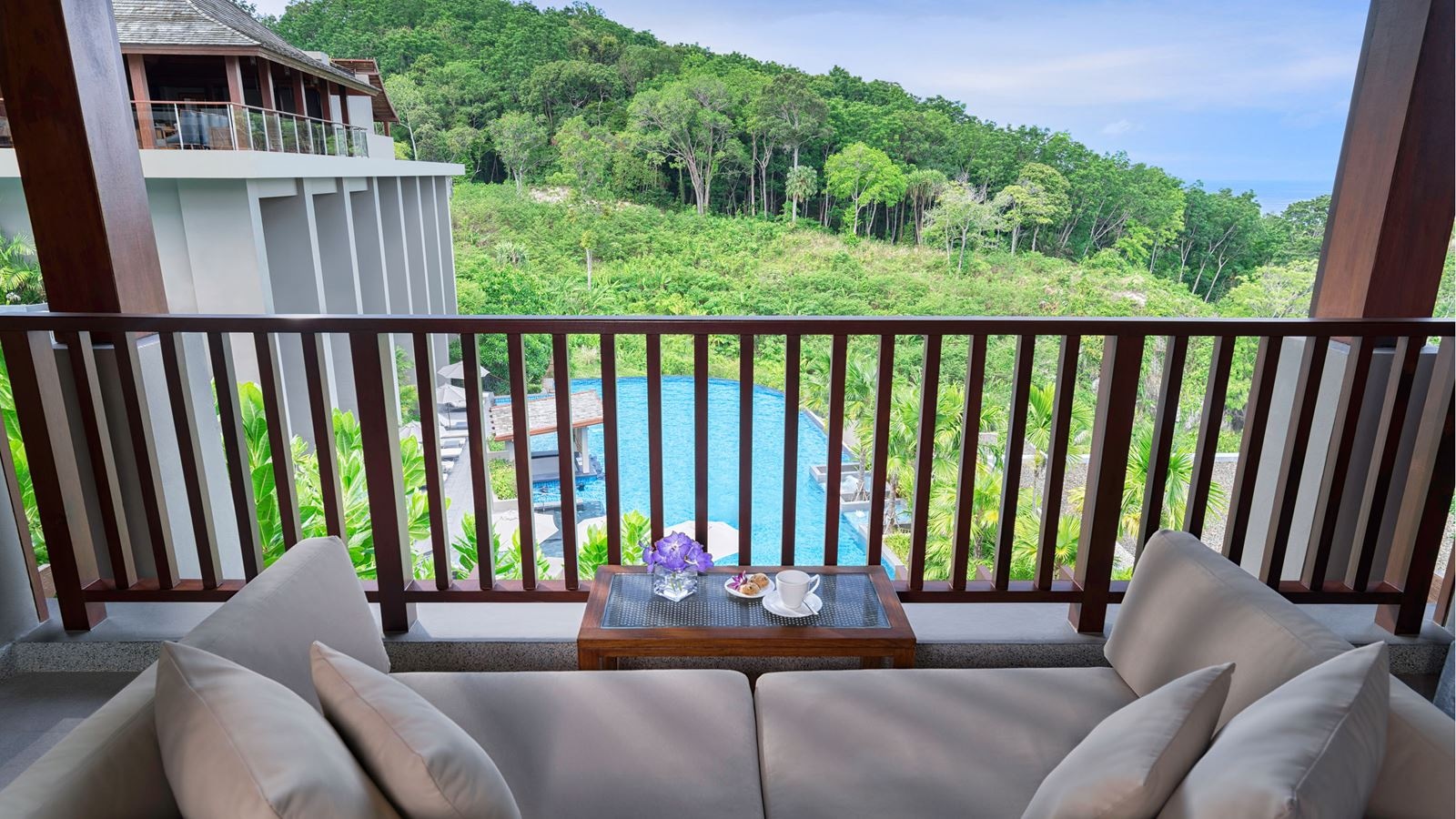 rooms-deluxe-room-pool-view-1-king-bed--1-sofa-bed