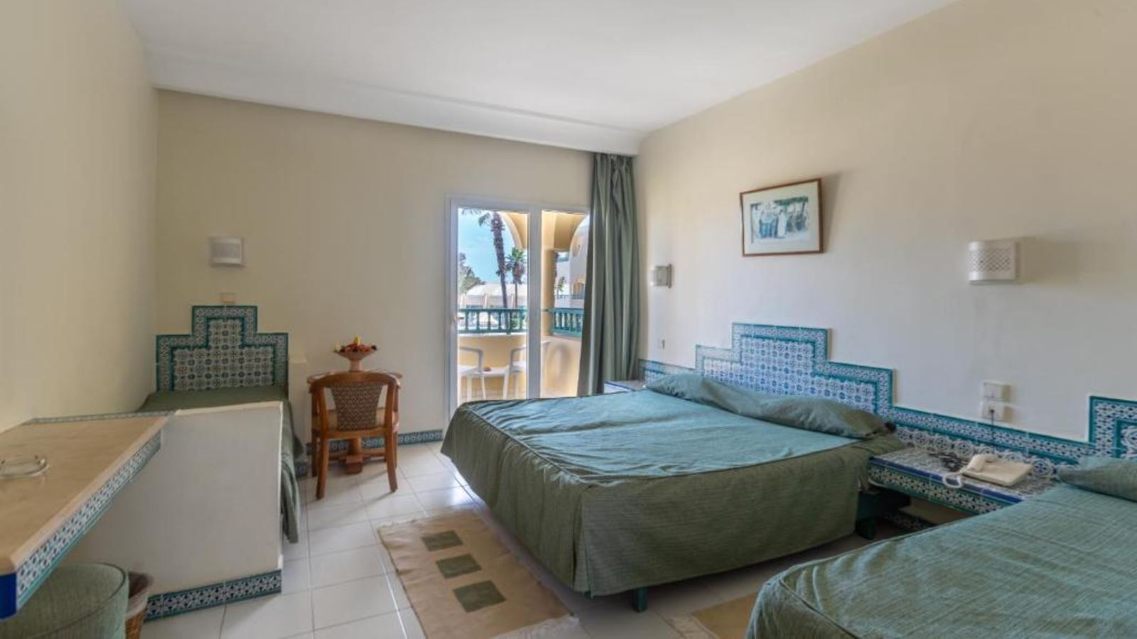 rooms-quadruple-room-garden-view