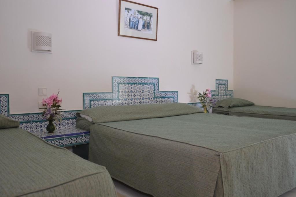 rooms-quadruple-room-garden-view