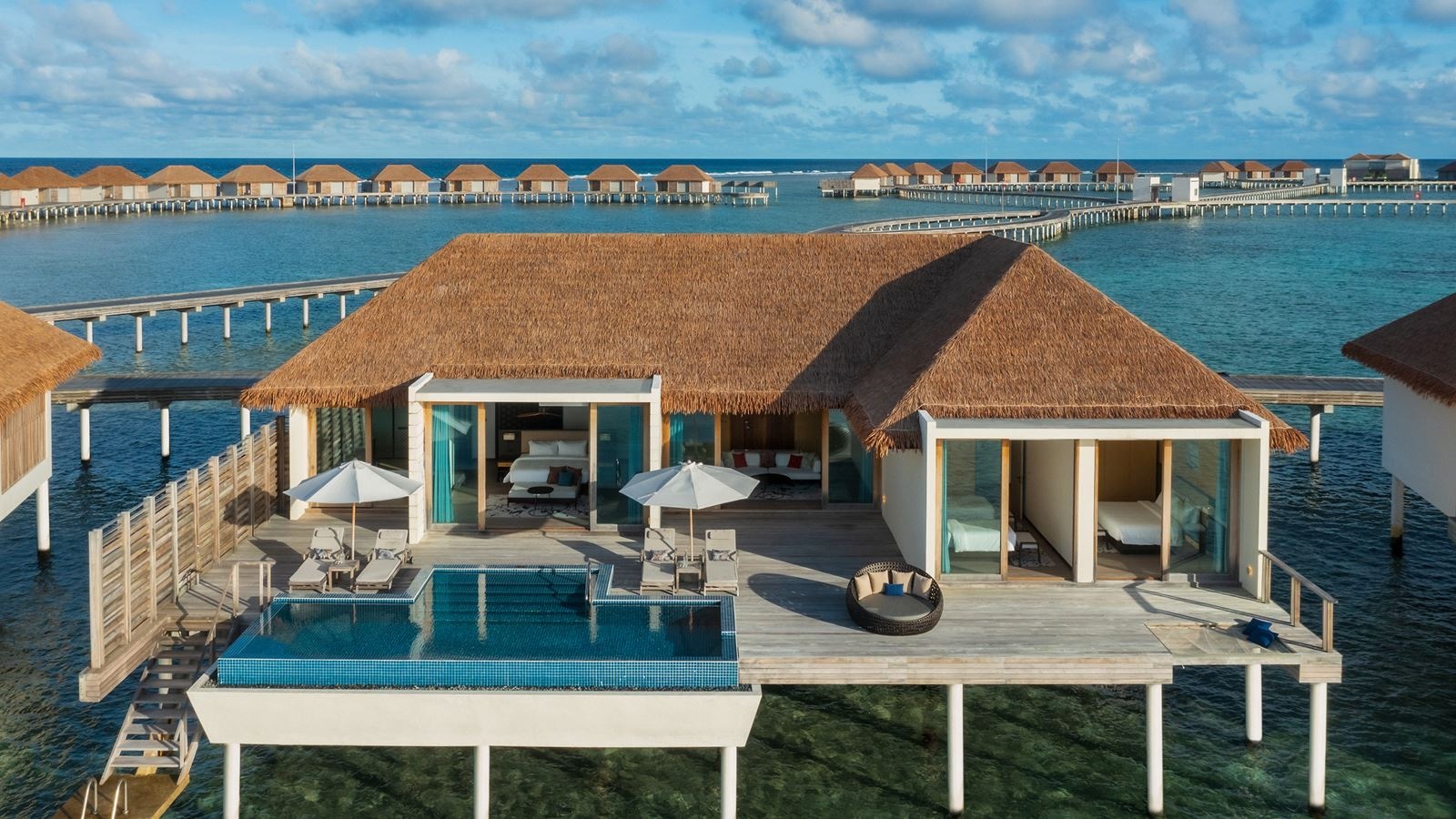 rooms-overwater-villa--3-bedrooms--pool--lagoon-view