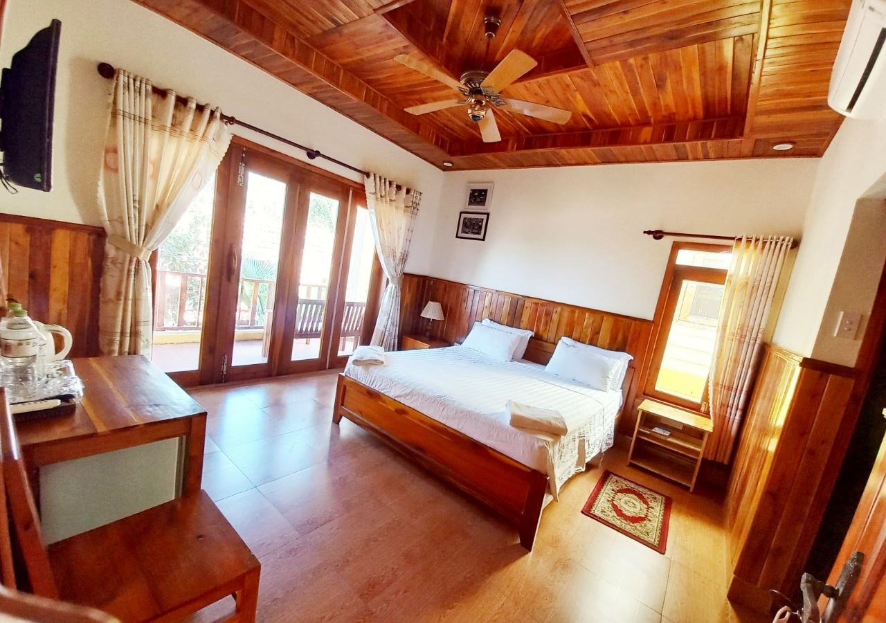 rooms-deluxe-double-roh-garden-view-with-balcony