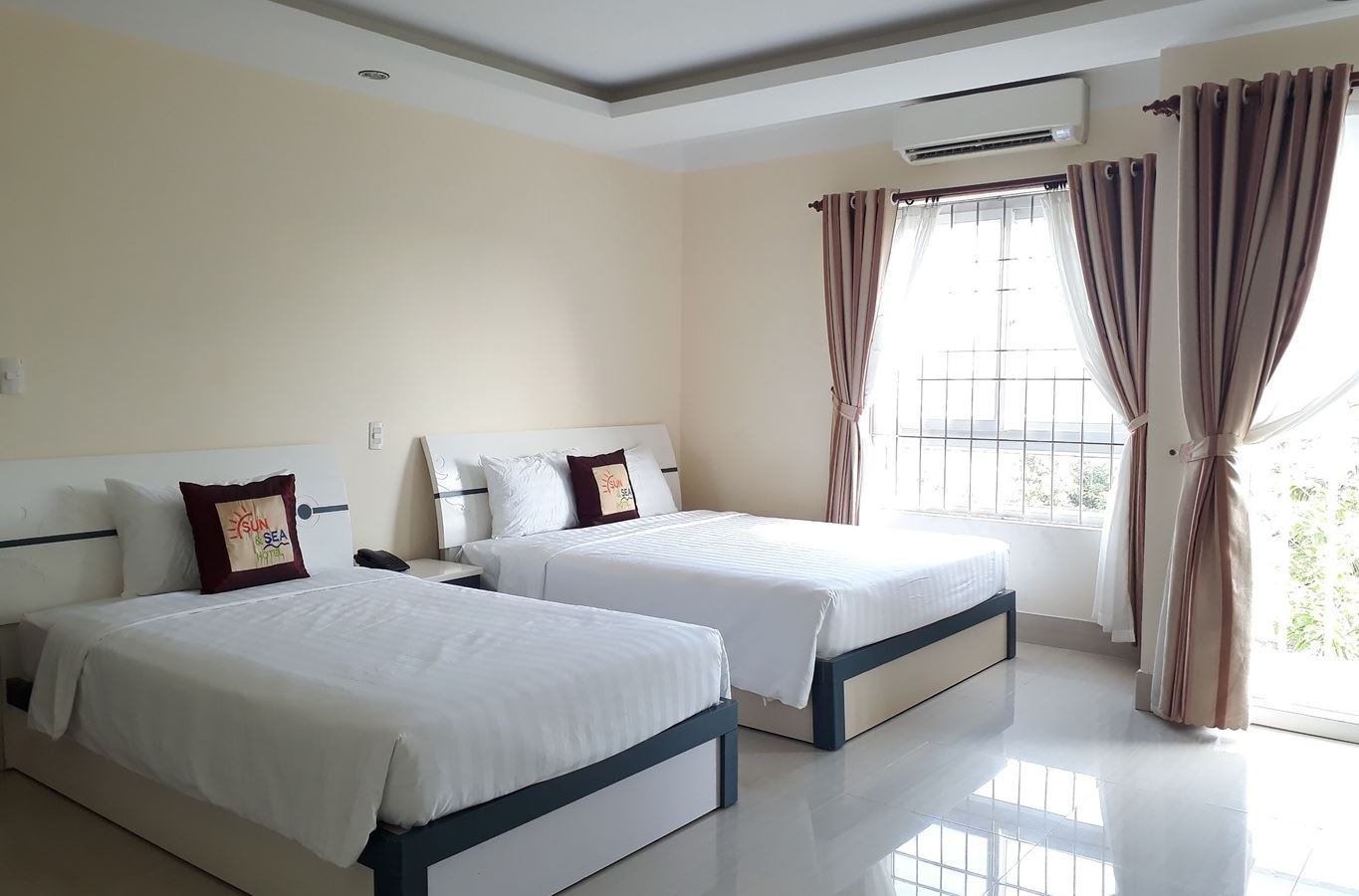 rooms-deluxe-triple-room