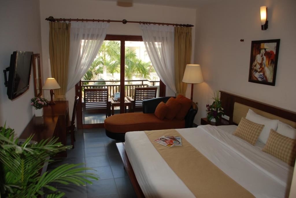 rooms-deluxe-garden-view-balcony-child-without-extra-bed