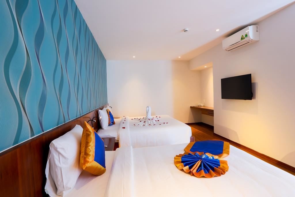 rooms-deluxe-triple-room