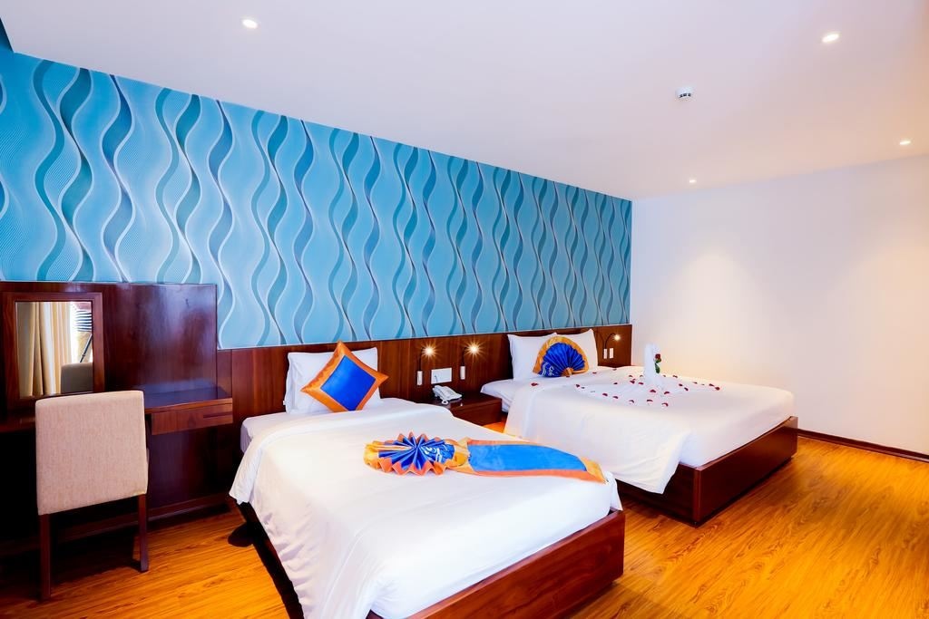 rooms-deluxe-triple-room