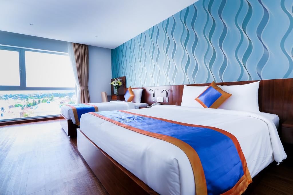 rooms-deluxe-triple-room