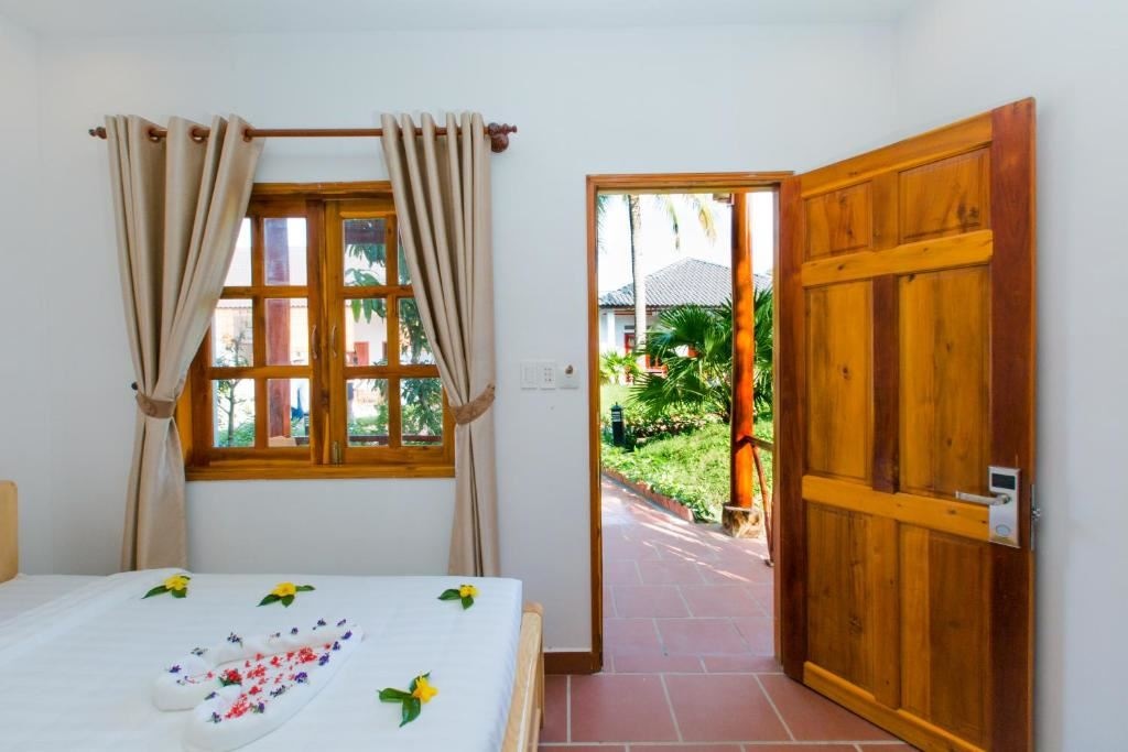 rooms-deluxe-room-garden-view-child-without-extra-bed