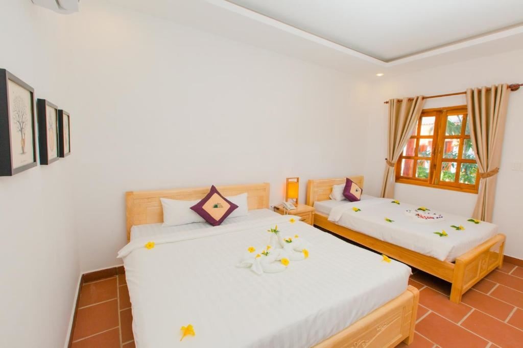 rooms-deluxe-room-garden-view-child-without-extra-bed