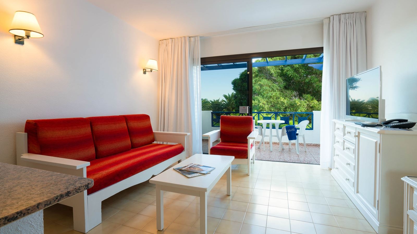 rooms-family-standard-pool--garden-view-balcony-or-terrace