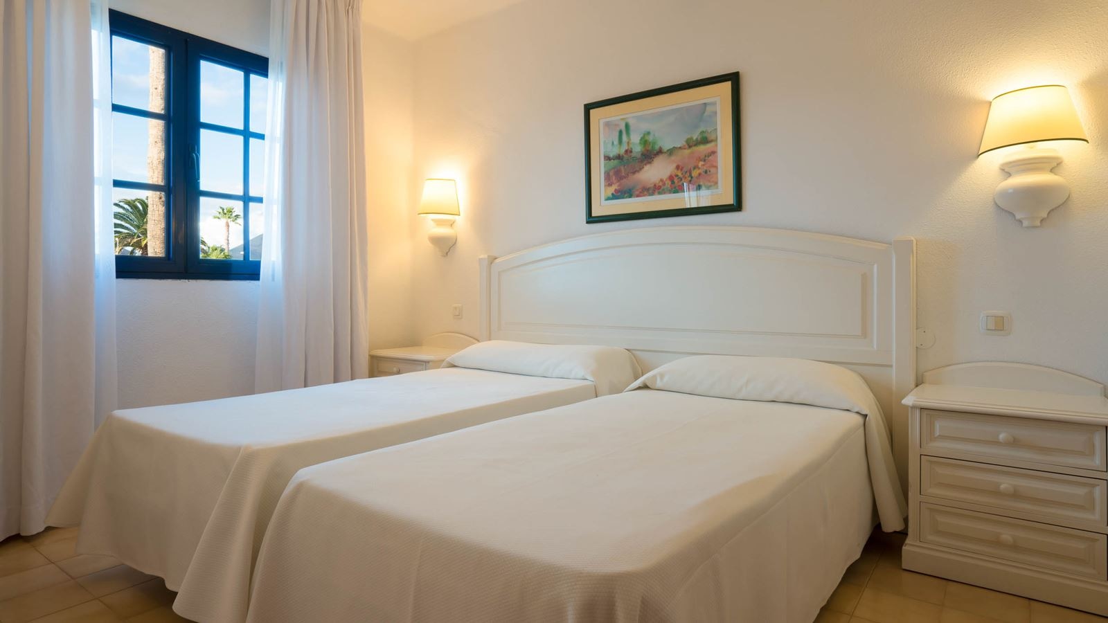 rooms-family-standard-pool--garden-view-balcony-or-terrace