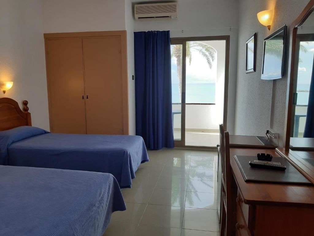 rooms-triple-standard-room-sea-view