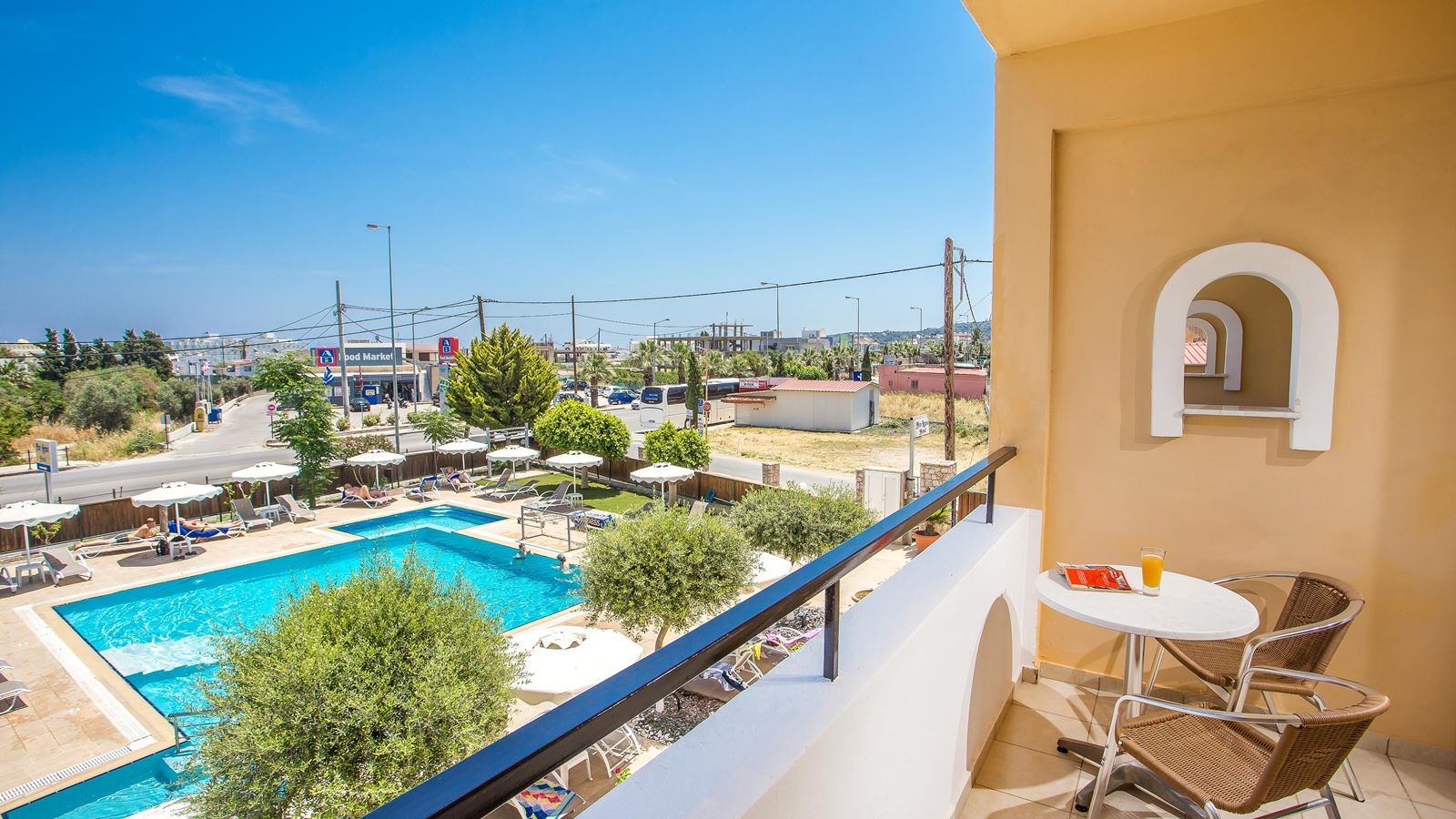 rooms-double-room-poolroad-view-with-balcony