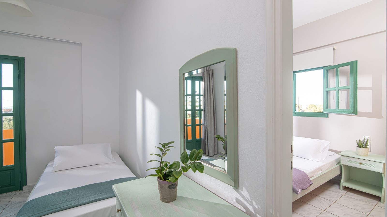 rooms-triple-one-bedroom-apartment-with-garden-or-pool-view