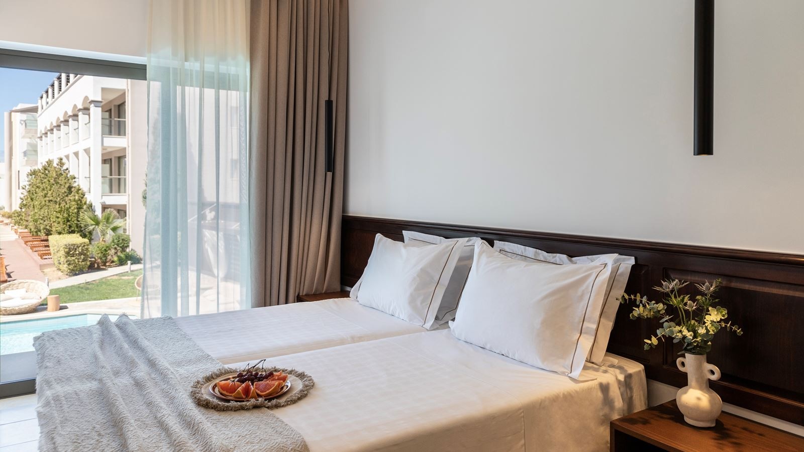 rooms-room-cozy-poolview-balcony-or-terrace