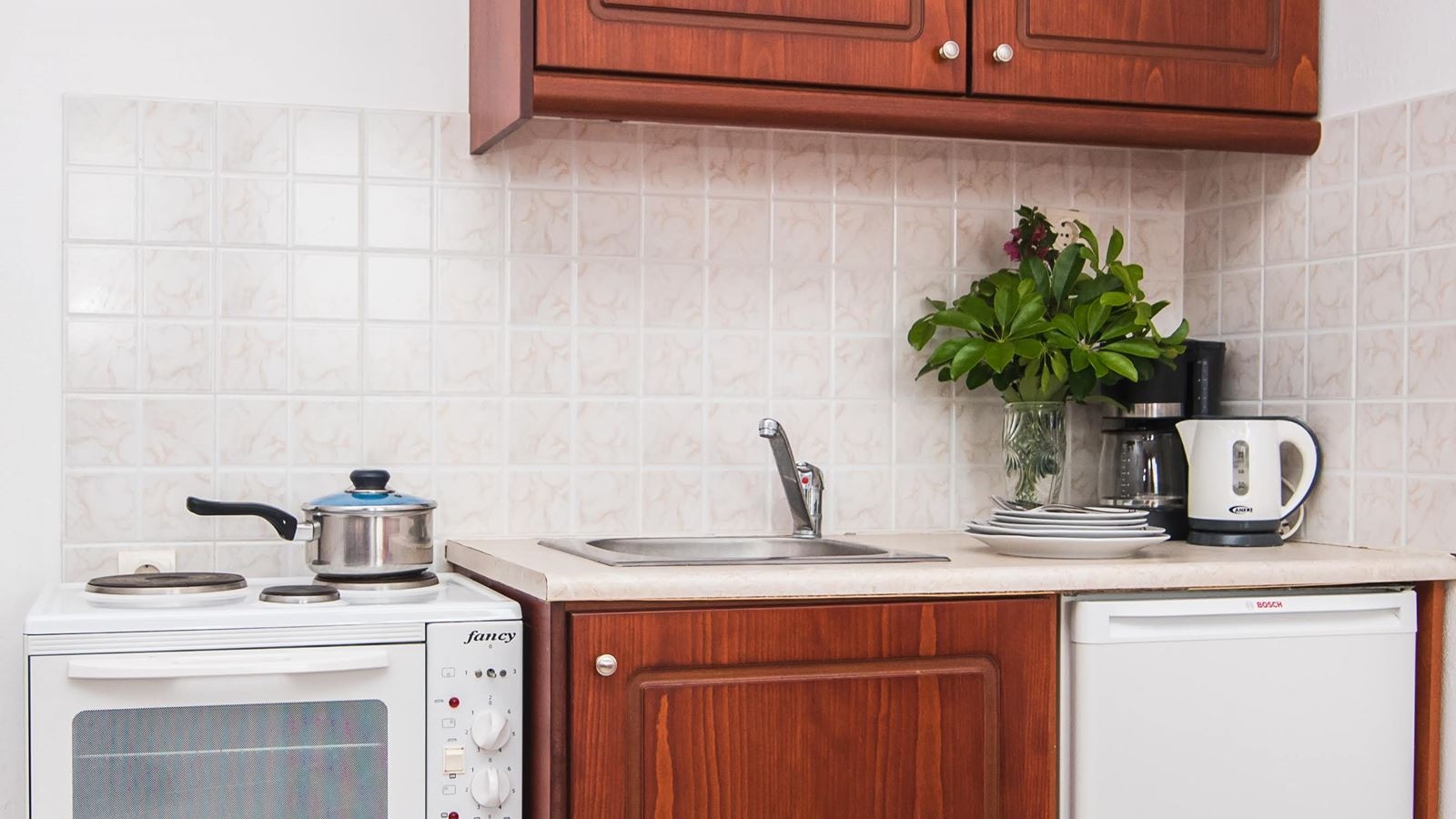 rooms-one-bedroom-apartment-garden-view-or-side-sea-view-4-pax