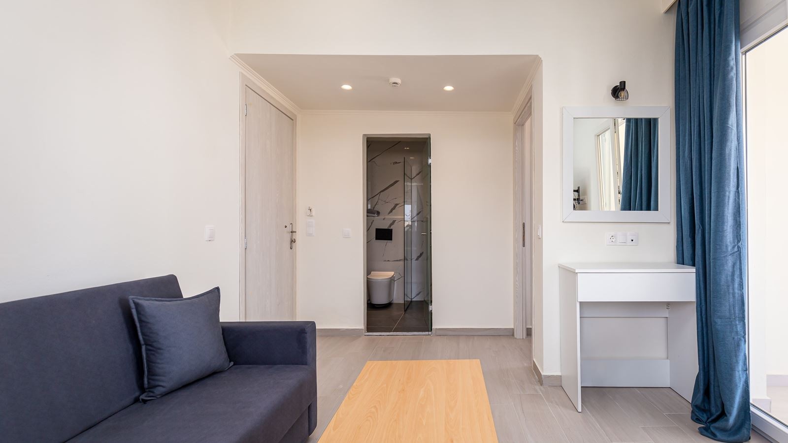 rooms-quadruple-room-seaview-balcony-or-terrace