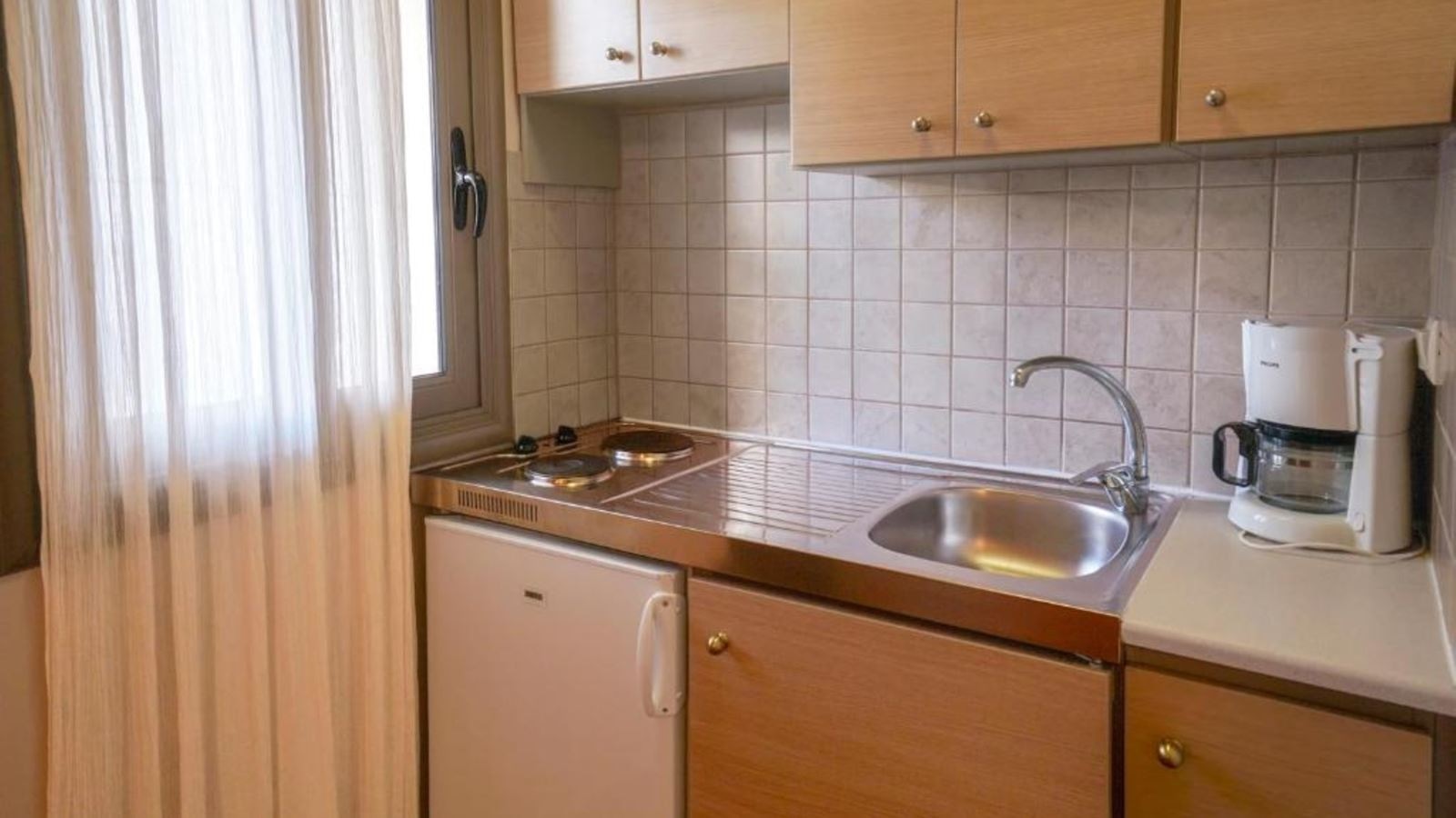 rooms-superior-maisonette-pool-view-balcony-or-terrace