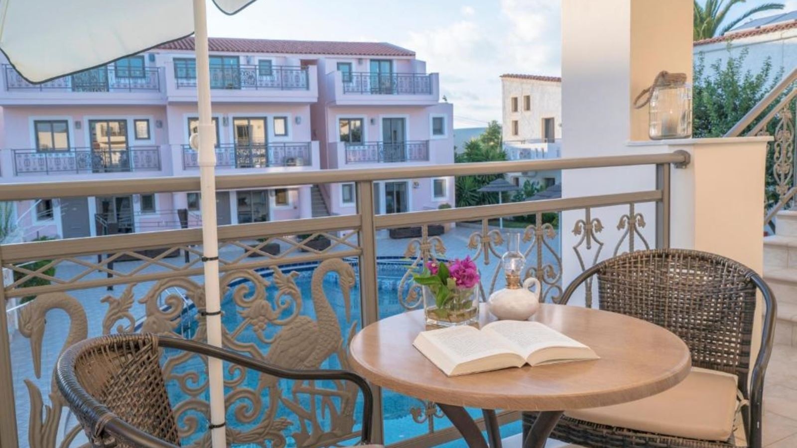 rooms-superior-maisonette-pool-view-balcony-or-terrace