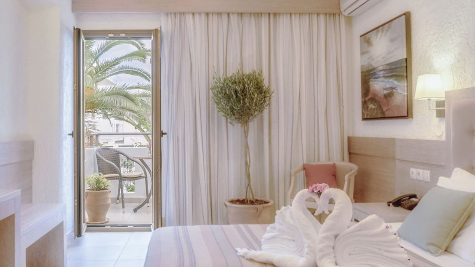 rooms-superior-studio-garden-or-pool-view-balcony-or-terrace