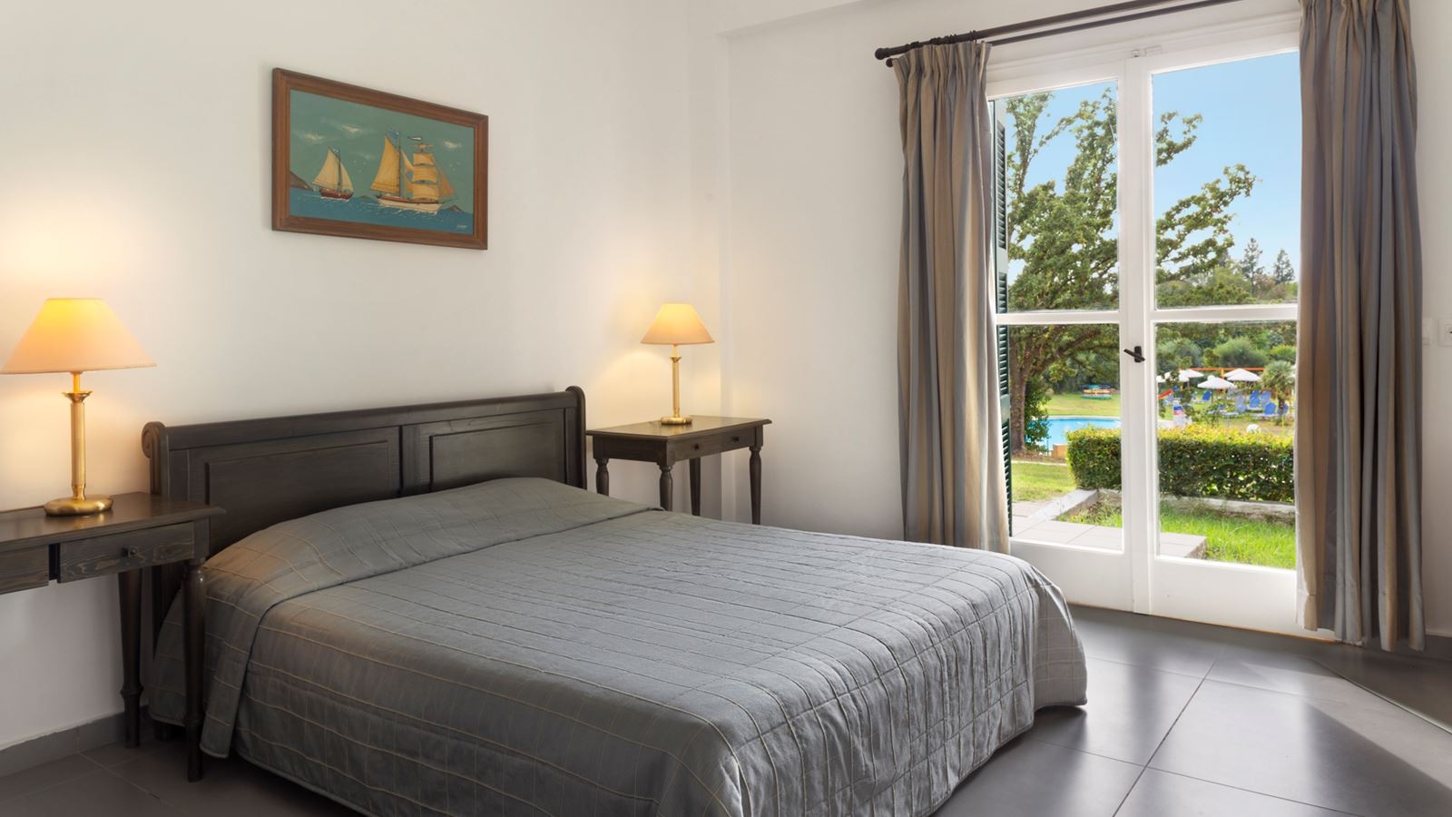 rooms-two-bedroom-family-superior-pool-view-balcony-or-terrace