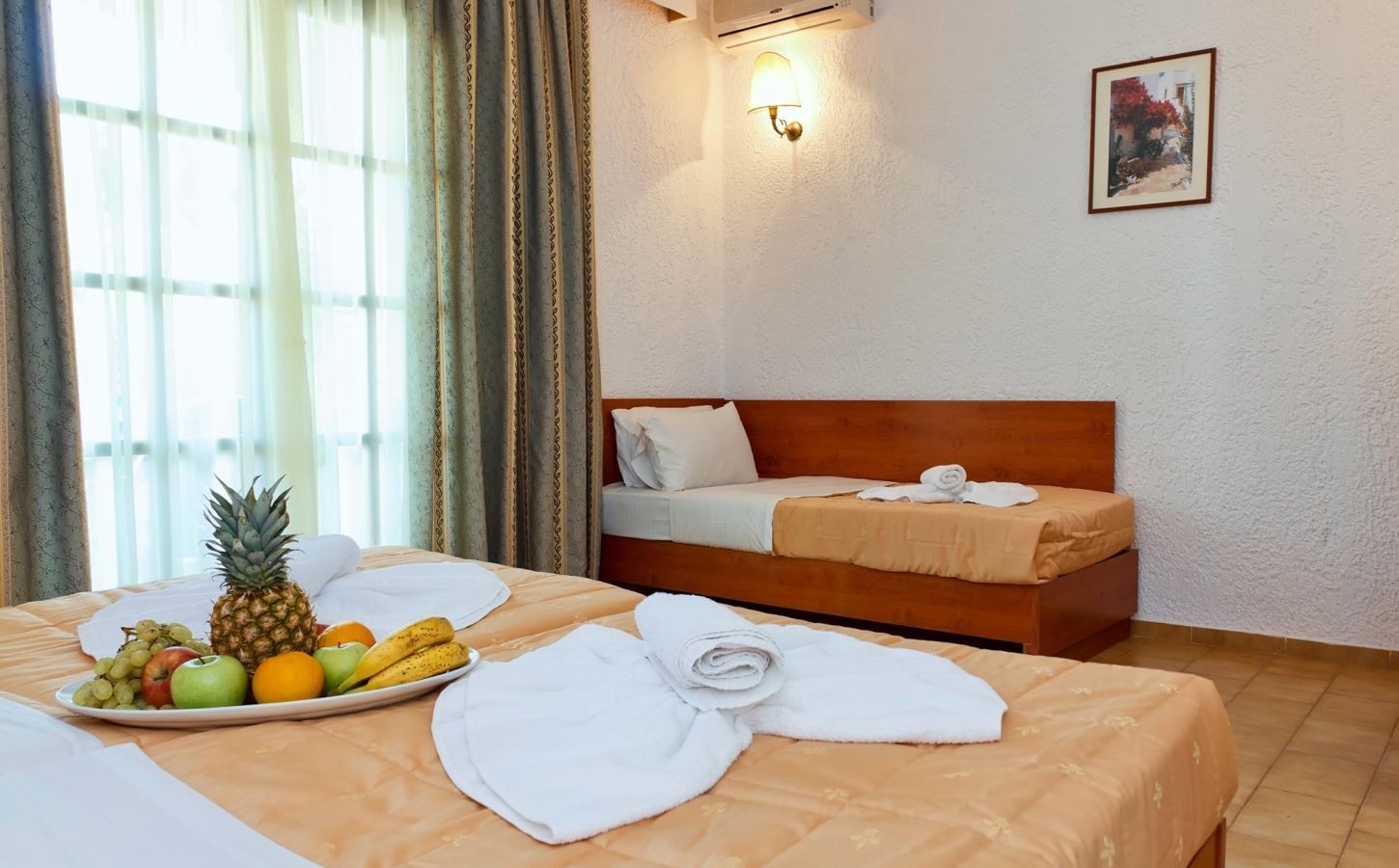 rooms-bungalow-standard-triple-gardenview-balcony-or-terrace