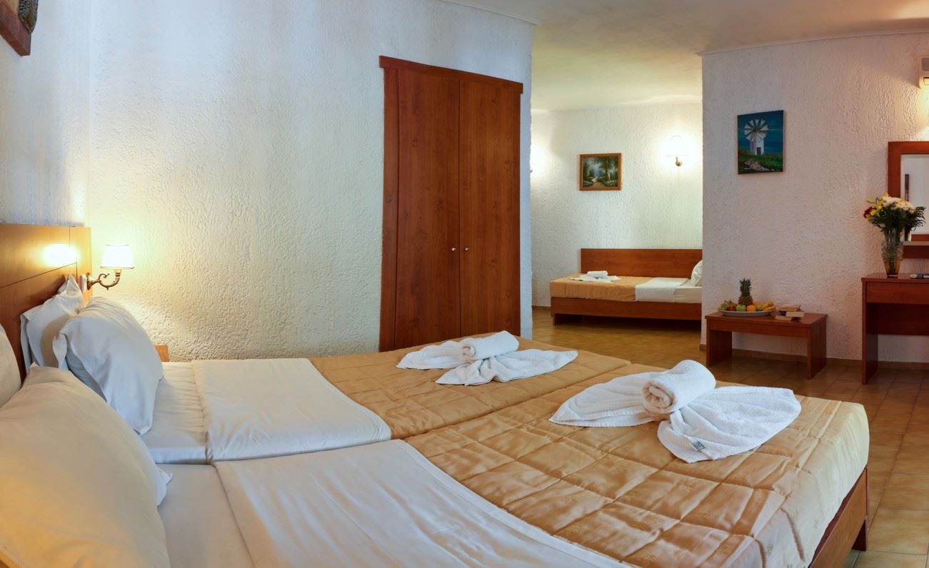 rooms-bungalow-standard-triple-gardenview-balcony-or-terrace