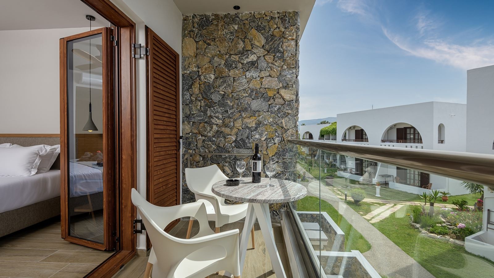 rooms-room-superior-double-gardenview-balcony-or-terrace-with-private-sunbeds