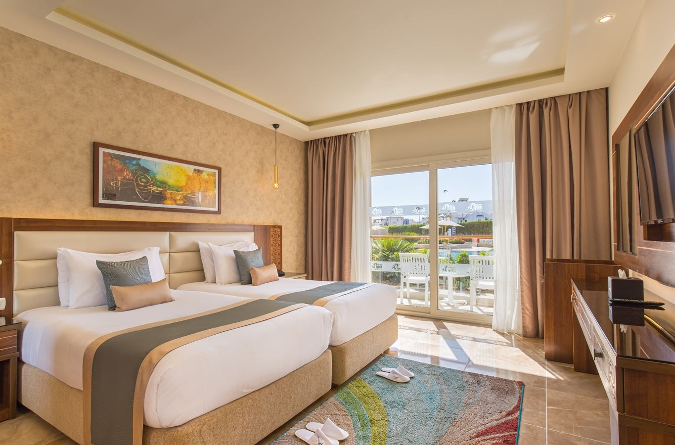 rooms-family-large-gardenpool-view